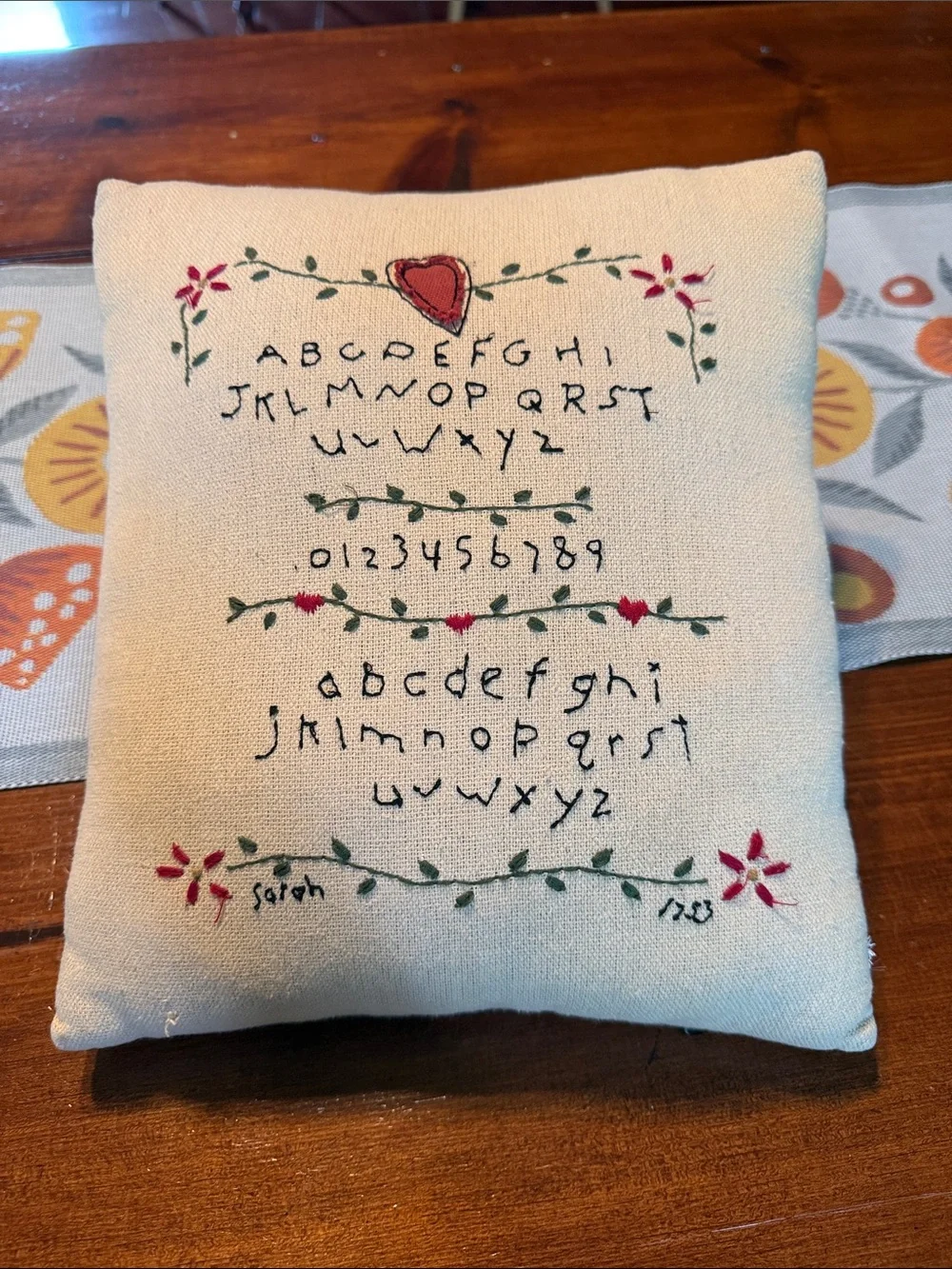 Hand-Embroidered Alphabet Pillow with Floral Motif